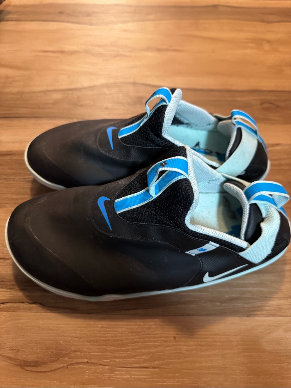 Nike Black Slip-On Loafers with Blue Accents